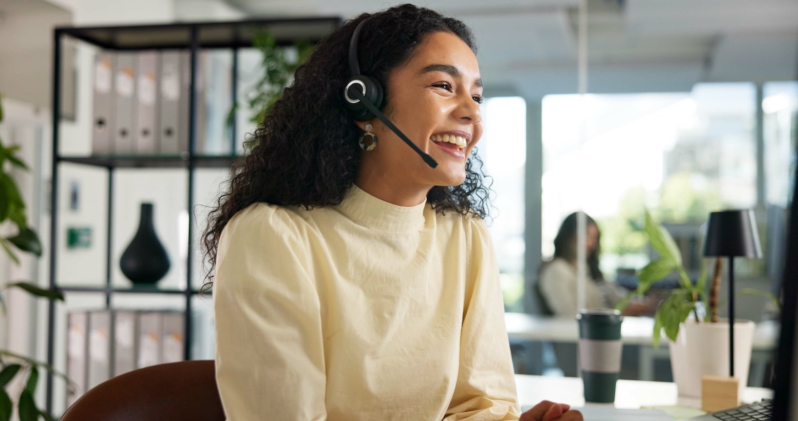 Woman speaking into a headset