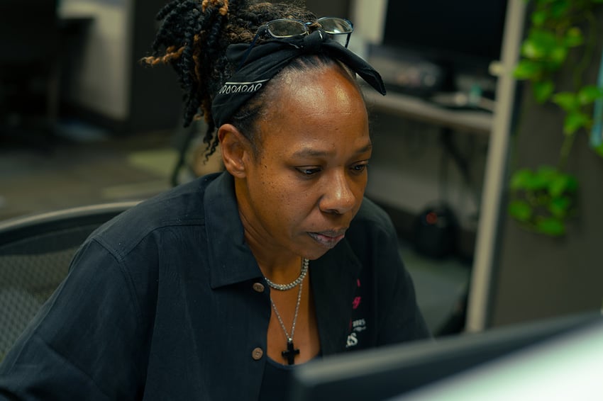a payday hcm csr looks at their computer
