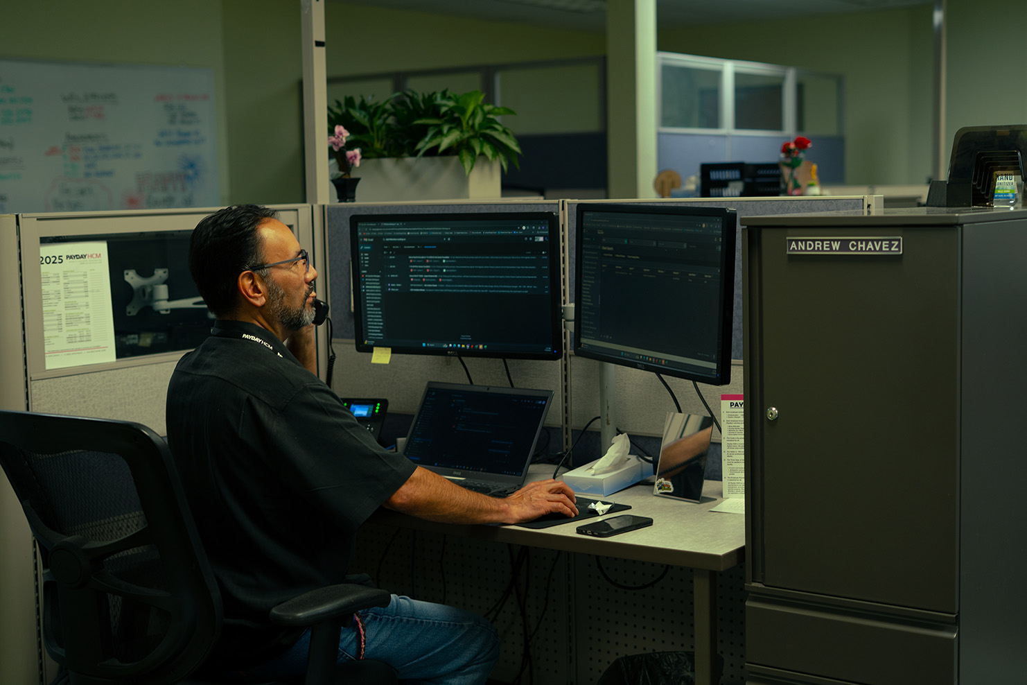 a payday employee works at their desk