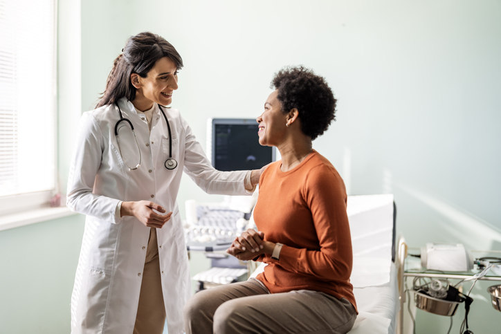 Doctor speaking with a patient